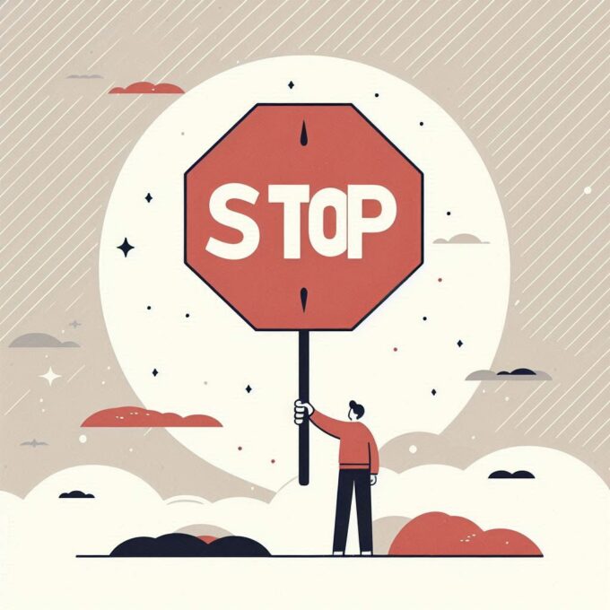 seseorang memegang tanda "stop," melambangkan pentingnya berkata "tidak"